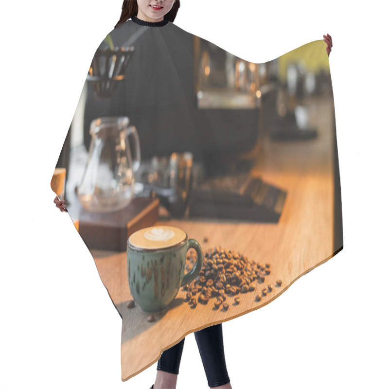 Personality  Cup Of Cappuccino And Coffee Beans On Worktop In Blurred Coffee Shop On Background Hair Cutting Cape