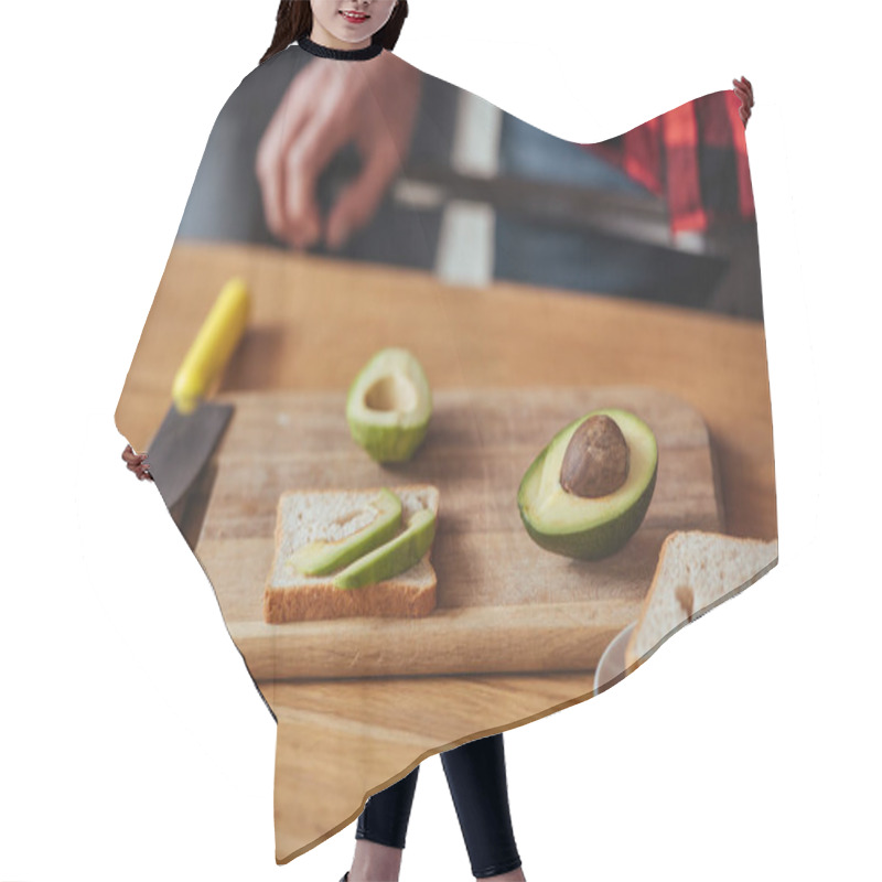 Personality  Cropped View Of Man Near Chopping Board With Bread, Knife And Halves Of Fresh Avocado Hair Cutting Cape