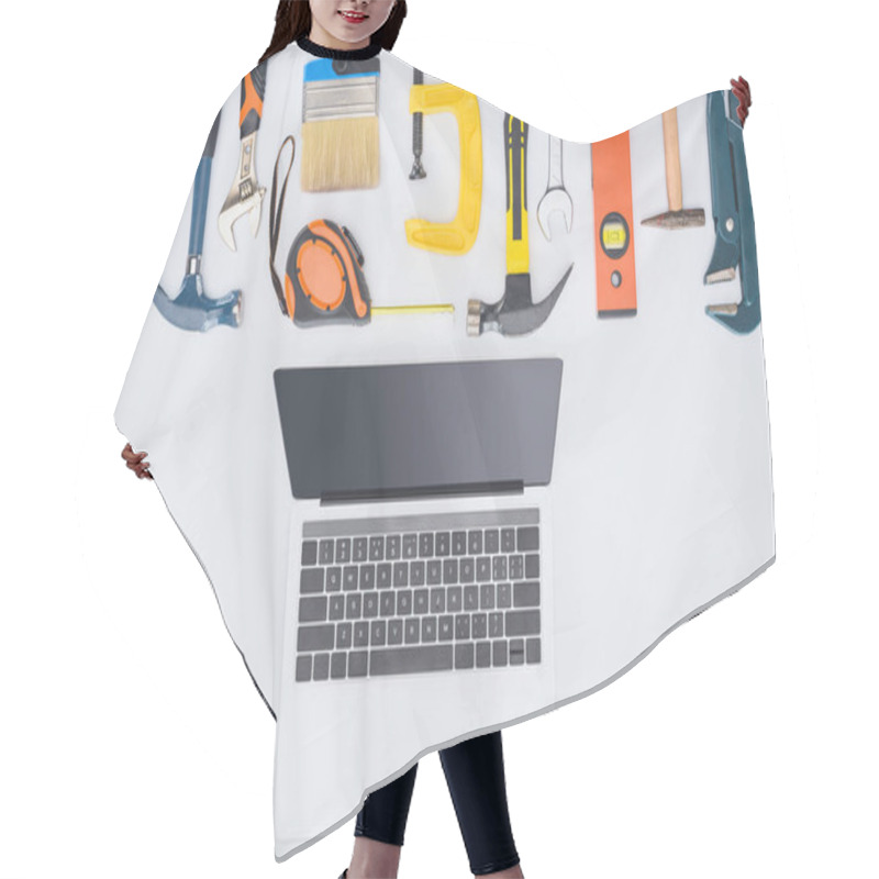 Personality  Top View Of Laptop With Different Tools Lying On White Hair Cutting Cape