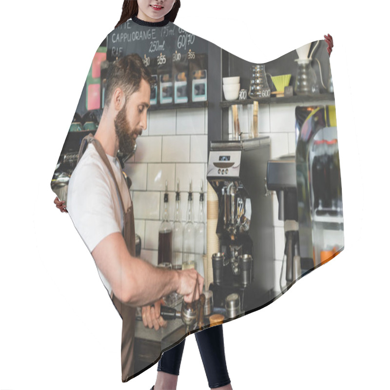 Personality  Side View Of Bearded Barista In Apron Pressing Coffee In Holder While Working In Coffee Shop Hair Cutting Cape