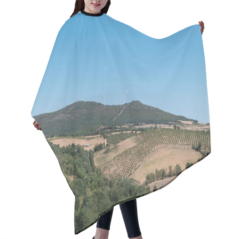 Personality  Mountains With Wind Turbines In The Background. Agricultural Field With Almond Trees. Sustainable Rural Landscape In A Sunny Tras Os Montes, Portugal Hair Cutting Cape