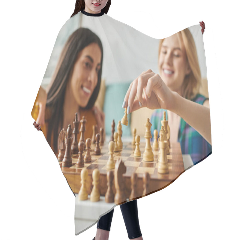 Personality  Two Young Women Share A Playful Chess Match, Smiling And Enjoying Each Others Company. Hair Cutting Cape