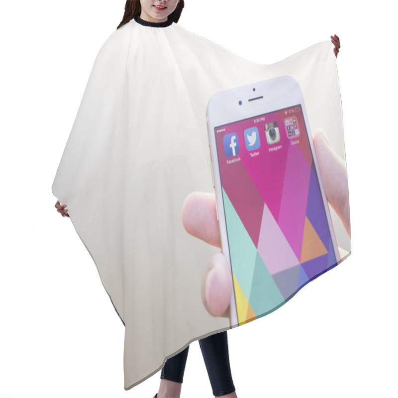 Personality  CHIANG MAI, THAILAND - JANUARY 02, 2015: All Of Popular Social Media Icons On Smartphone Device Screen With Hand Holding On Apple IPhone 6. Hair Cutting Cape