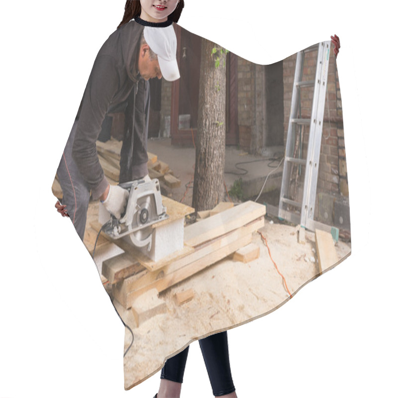 Personality  Man Using Power Saw To Cut Planks Of Wood Hair Cutting Cape