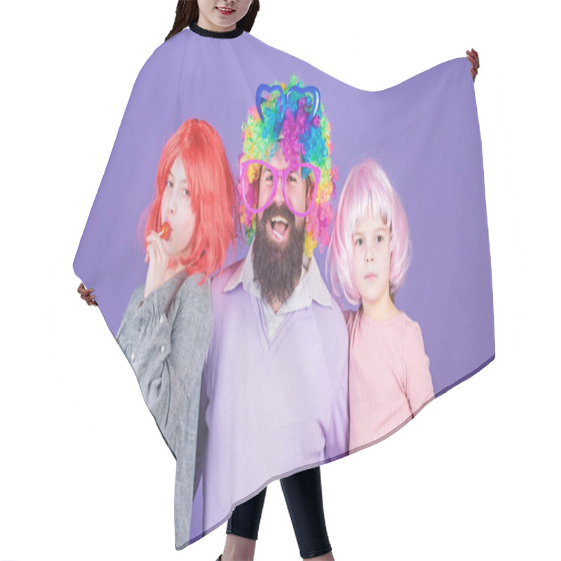 Personality  Just For Fun. Party Time. How Crazy Is Your Father. Man Bearded Father And Kids Girls Wear Colorful Wig Violet Background. Friendly Family Wear Party Accessories. Best Dad Ever. Father Hug Daughters Hair Cutting Cape