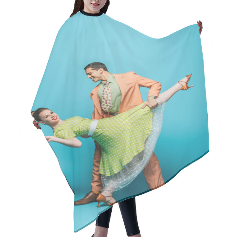 Personality  Stylish Dancer Supporting Girl While Dancing Boogie-woogie On Blue Background Hair Cutting Cape