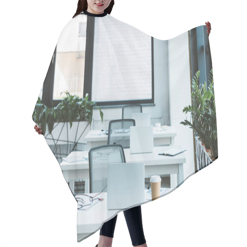 Personality  Headsets And Laptops On Tables In Light Empty Office  Hair Cutting Cape