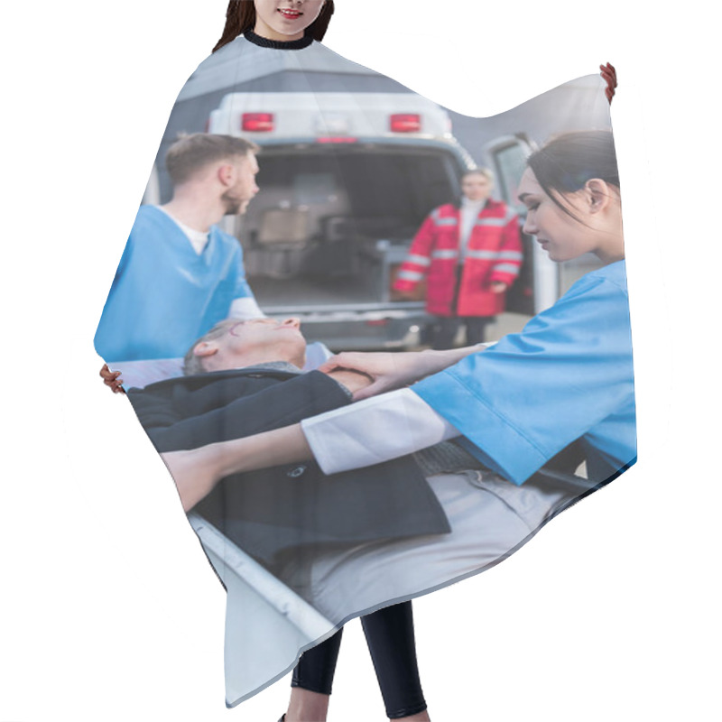 Personality  Young Paramedics Moving Wounded Man On Ambulance Stretcher  Hair Cutting Cape