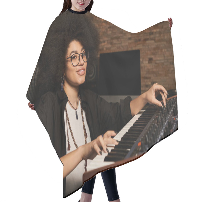 Personality  Female With Afro Hair Energetically Playing A Keyboard In A Recording Studio During A Music Band Rehearsal. Hair Cutting Cape