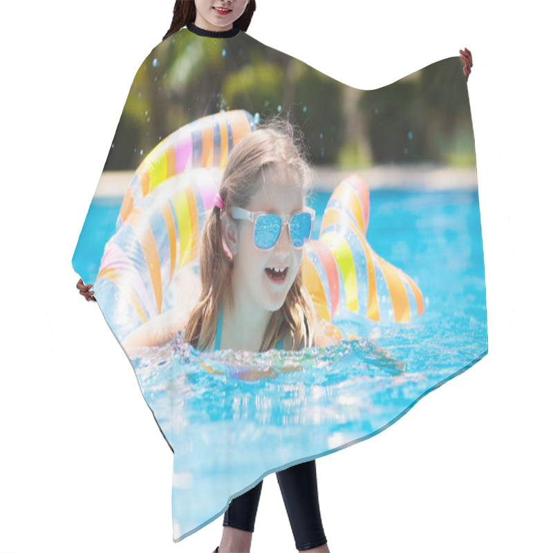 Personality  Child With Inflatable Toy Ring Float In Swimming Pool. Little Girl Learning To Swim And Dive In Outdoor Pool Of Tropical Resort. Swimming With Kids. Healthy Sport Activity For Children. Water Fun. Hair Cutting Cape