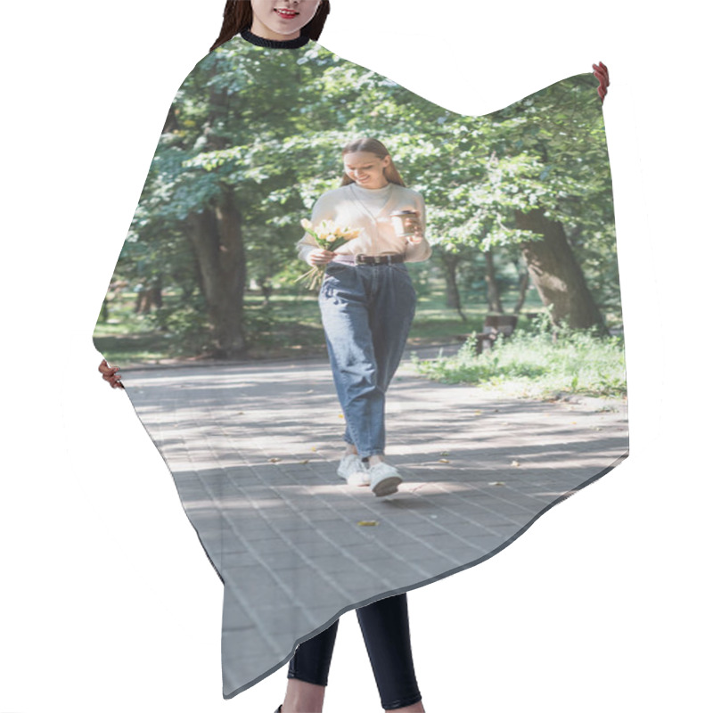 Personality  Full Length Of Smiling Woman In Glasses And Slouchy Jeans Walking With Tulips And Paper Cup In Park Hair Cutting Cape