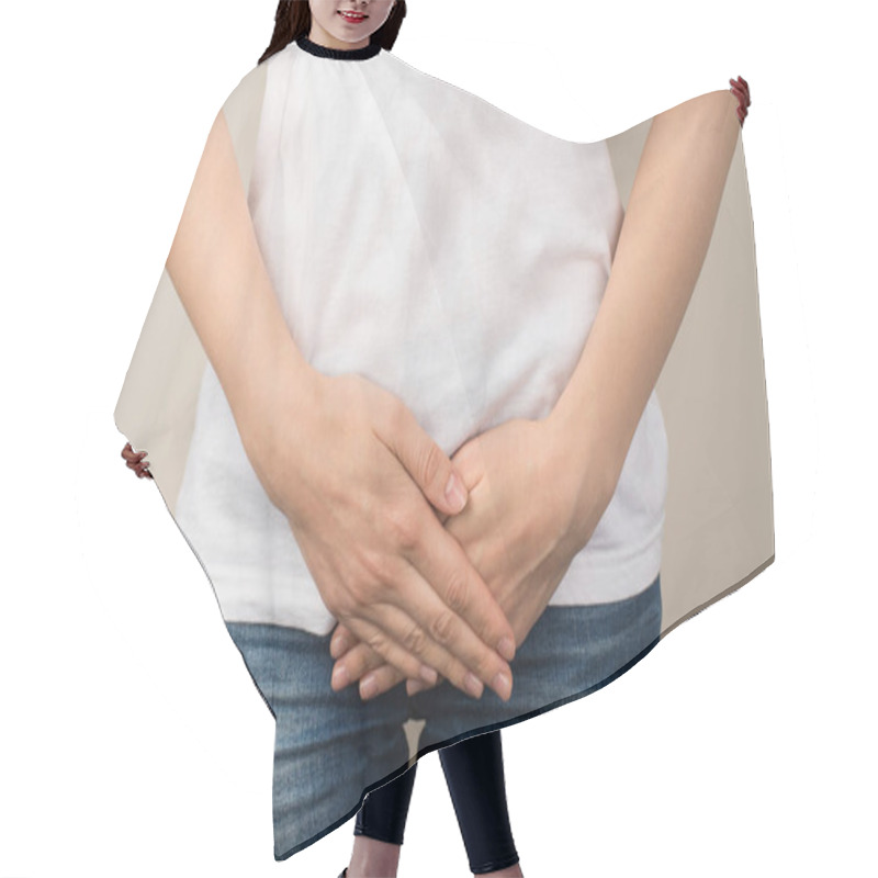 Personality  Cropped Closeup Photo Of Young Woman In White T-shirt And Jeans Holding Her Hands On Crotch On Isolated Grey Background Hair Cutting Cape