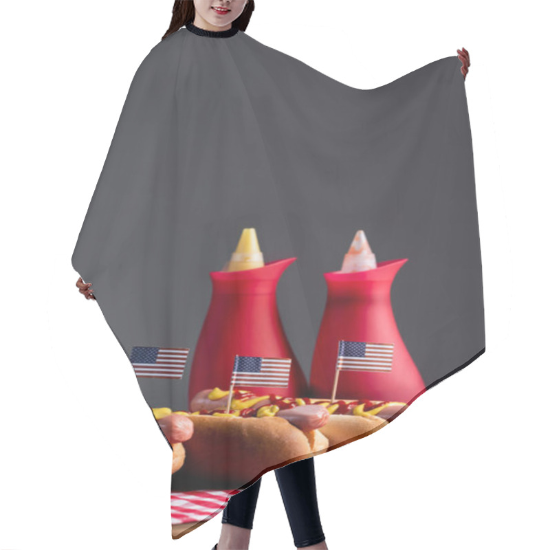 Personality  Blurred Sauce Bottles And Hot Dogs With Small American Flags On Plaid Table Napkin Isolated On Grey Hair Cutting Cape