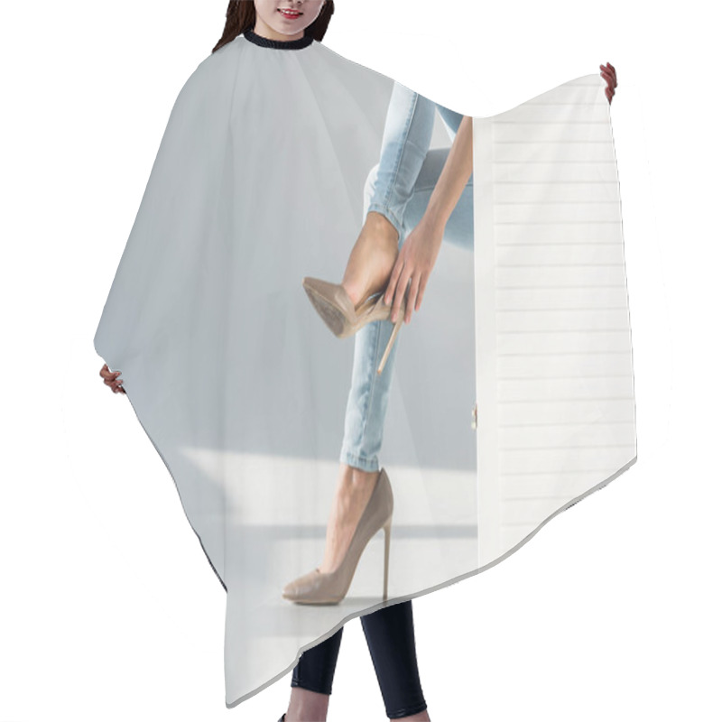 Personality  Partial View Of Woman Putting On High-heeled Shoes Behind Room Divider On Grey Background Hair Cutting Cape