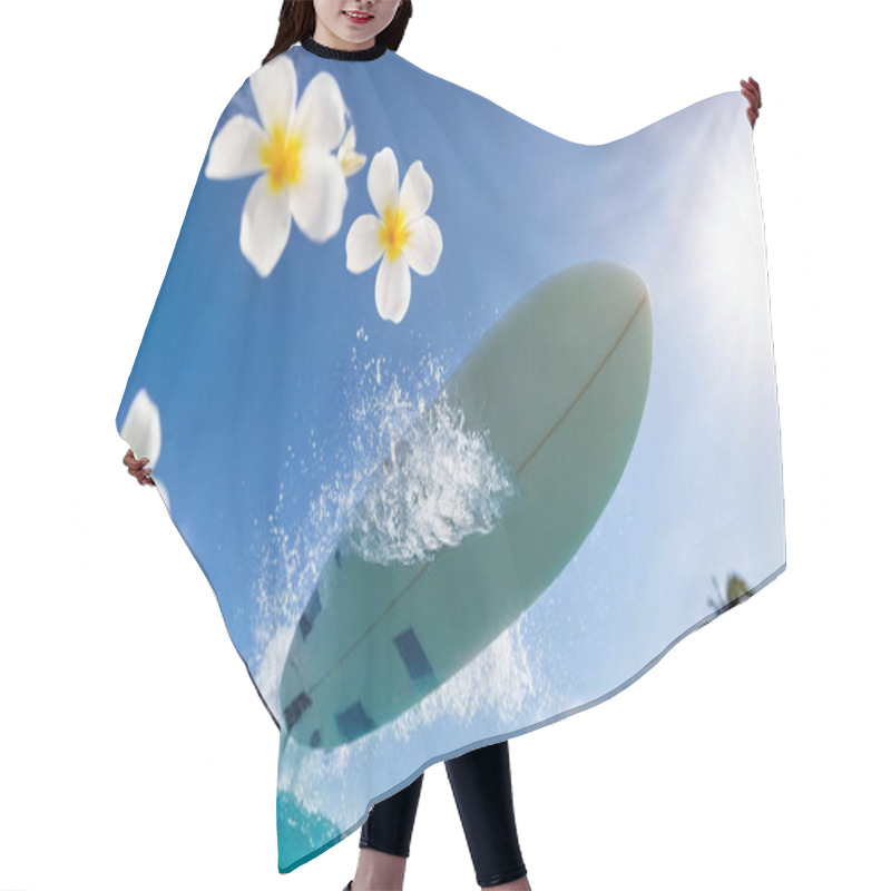 Personality  A Surfboard Floating Upright In The Air With Tropical Flowers And Sunlight Beams In The Background. Hair Cutting Cape