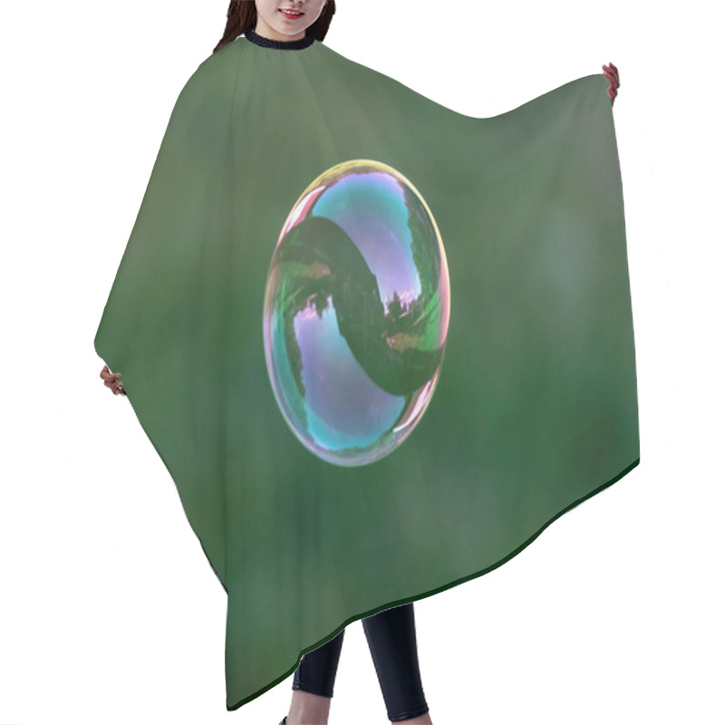 Personality  Close Up Of Flying Soap Bubble With Great Reflections. Flying Over Green Background Hair Cutting Cape