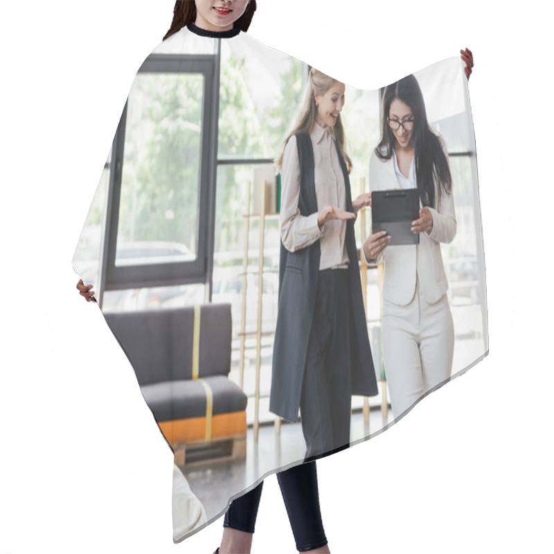 Personality  Selective Focus Of Excited Businesswomen Looking At Clipboard  Hair Cutting Cape