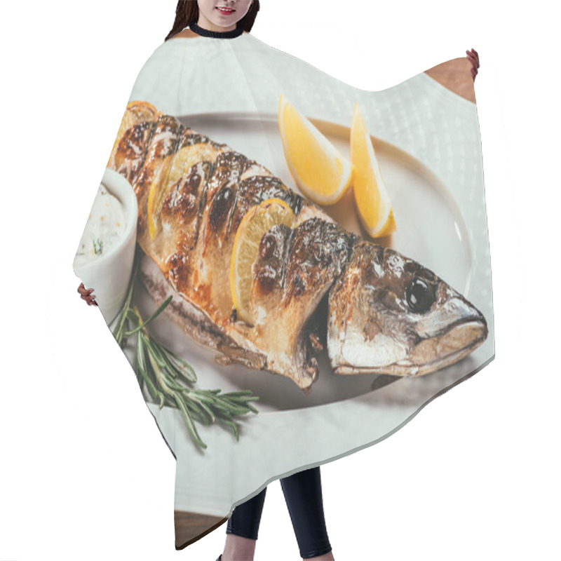 Personality  Fried Fish Laying On White Plate With Orange Slices And Sauce Over Wooden Surface   Hair Cutting Cape