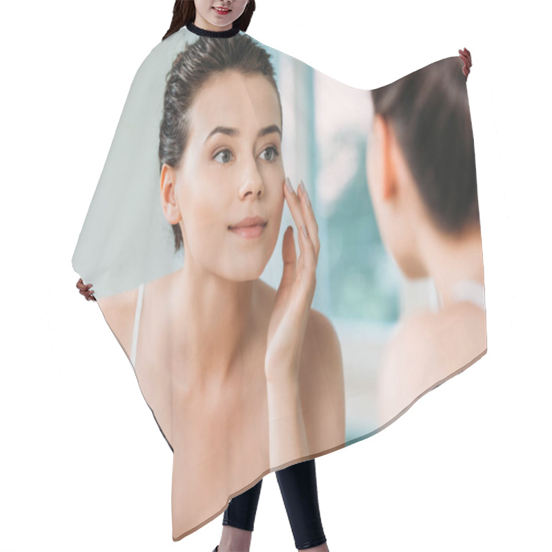 Personality  Beautiful Smiling Young Woman Touching Face And Looking At Mirror In Bathroom  Hair Cutting Cape