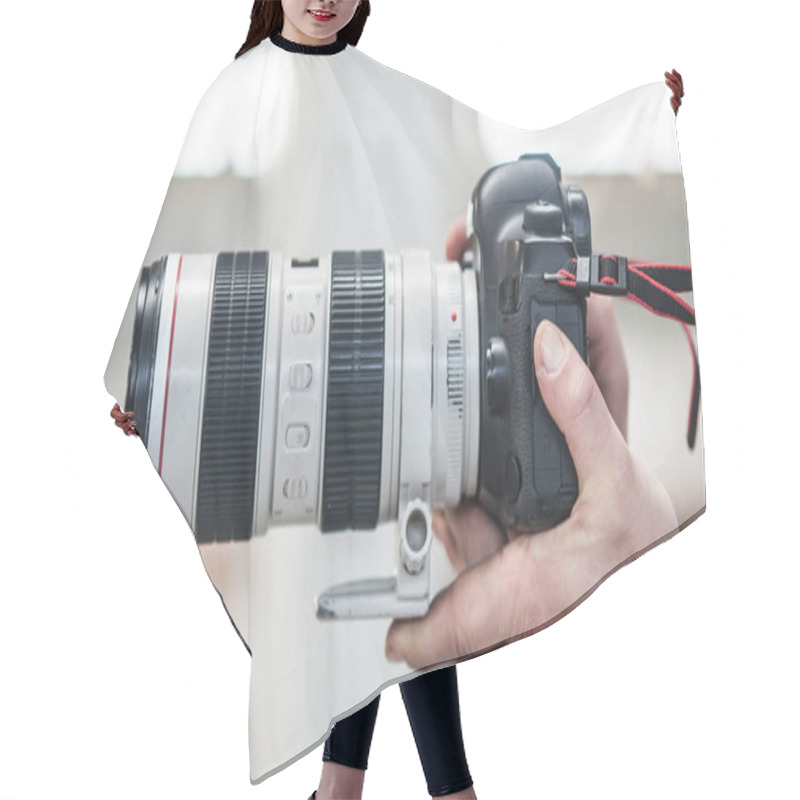 Personality  Man Hand Holding Camera And Take The Photo. Selective Focus Hair Cutting Cape