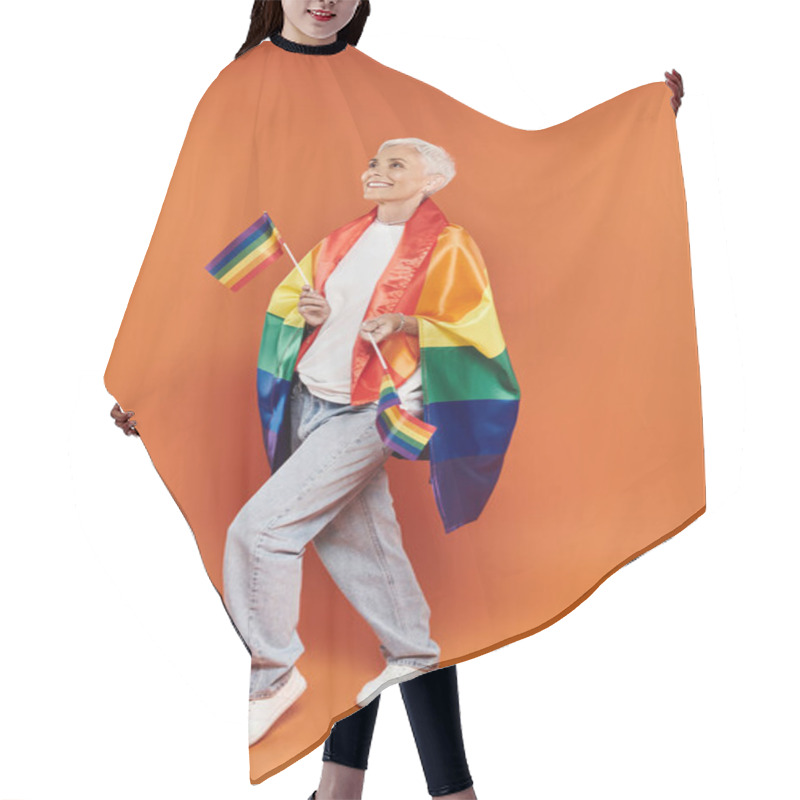 Personality  A Mature, Stylish Woman Joyfully Embraces Her Identity With Rainbow Flags. Hair Cutting Cape