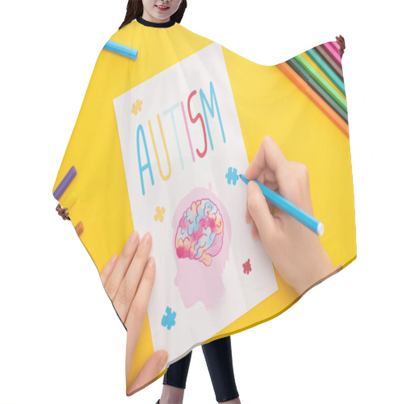 Personality  Cropped View Of Woman Drawing Card With Head, Brain And Puzzle For Autism Awareness Day On Yellow Hair Cutting Cape