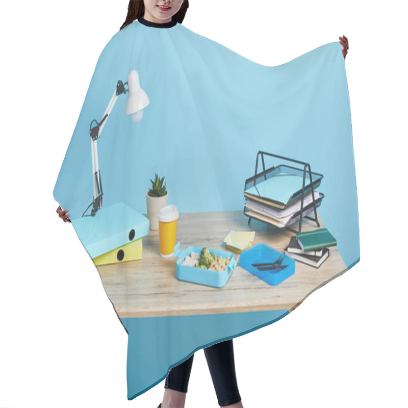 Personality  Studio Shot Of Workspace With Table And Lunch Box On Blue Background Hair Cutting Cape