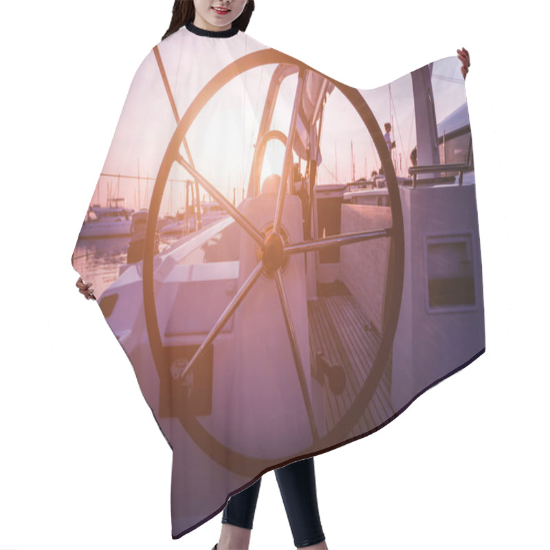 Personality  A Modern Speed Boat Yacht Steering Wheels. Background Hair Cutting Cape