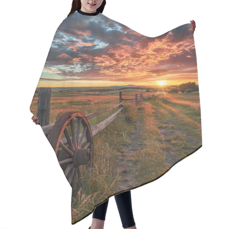 Personality  A Picturesque Countryside Landscape At Sunset With Vibrant Skies, A Wooden Fence, And An Old Wagon Wheel In A Grassy Field. Hair Cutting Cape