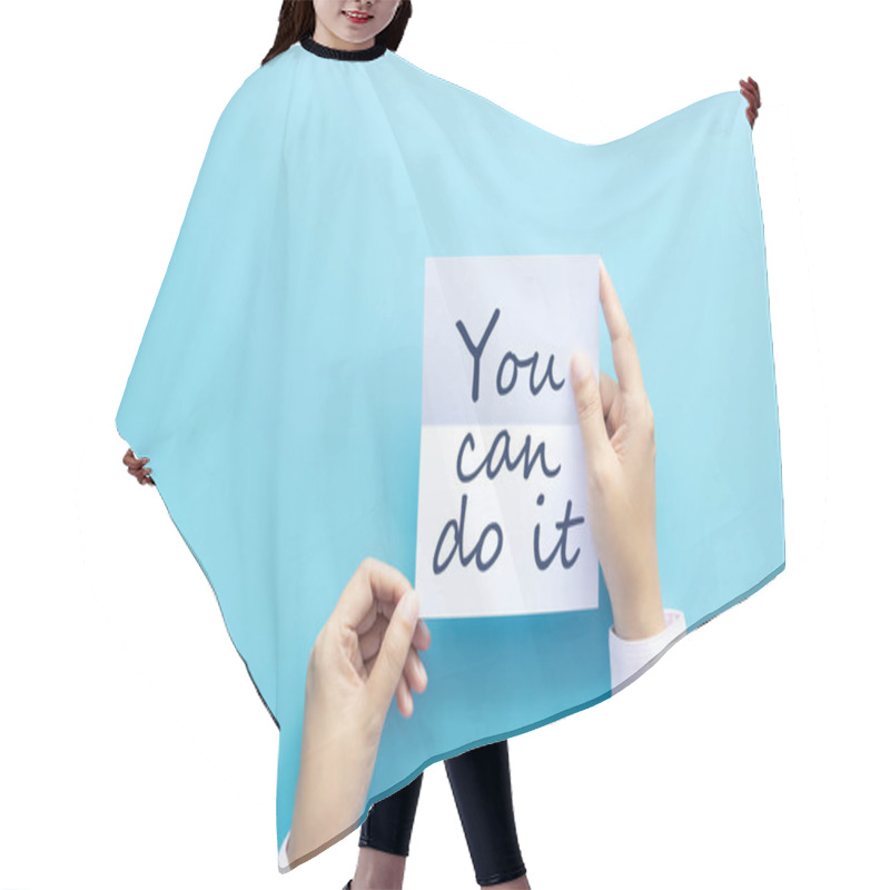 Personality  Woman Hand Holding Card With The Word You Can Do It Isolated On Blue Background, Studio Shot. Cheer And Support Quote Hair Cutting Cape