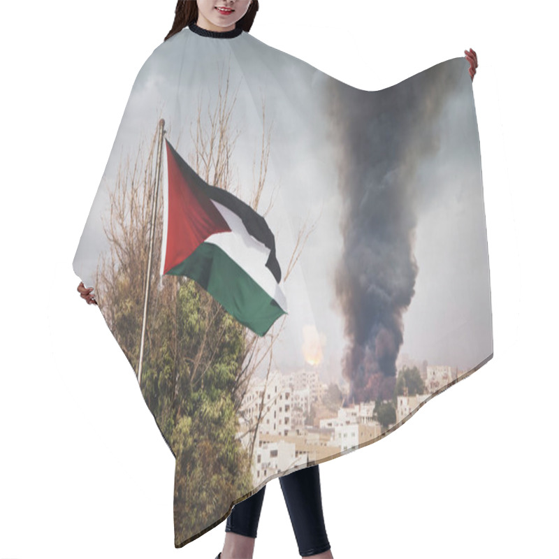 Personality  The Flag Of Palestine On The Mountain On The Background Of The Houses In The City. The War In The Middle East. Explosion With Black Smoke In The City. Hair Cutting Cape