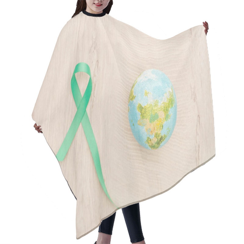 Personality  Top View Of Bright Toy Earth And Green Ribbon On Wooden Background  Hair Cutting Cape