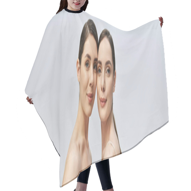 Personality  Twin Sisters Stand Close Together, Radiating Beauty And Confidence With Serene Expressions. Hair Cutting Cape