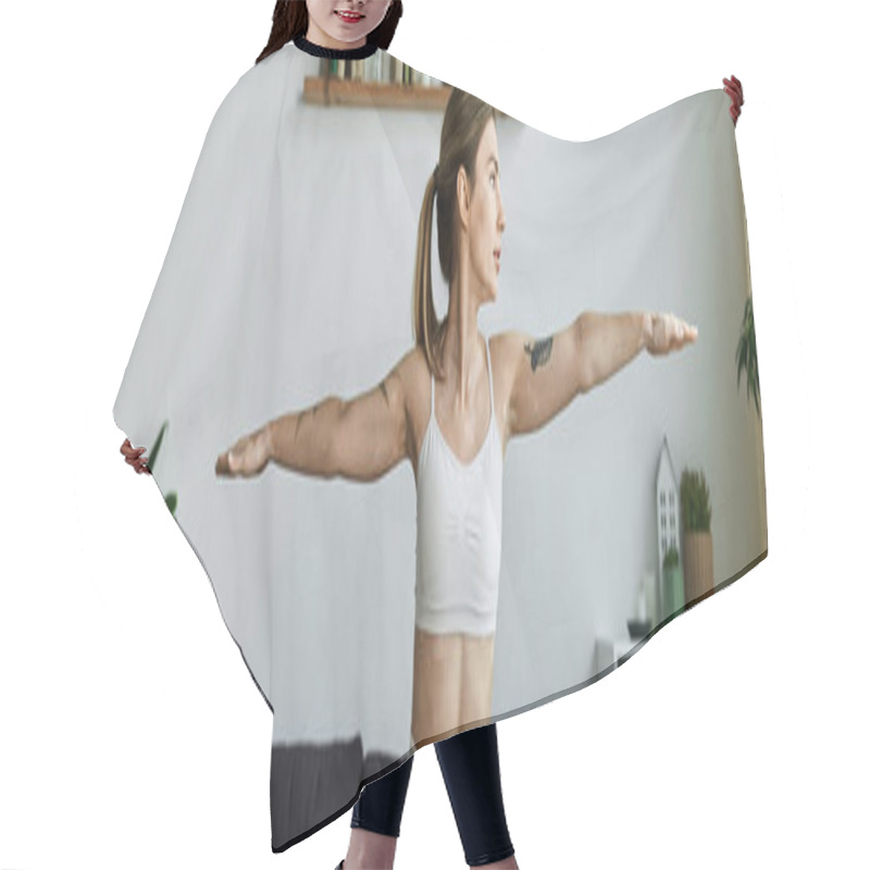 Personality  A Young Woman In Active Wear Practices A Yoga Pose In Her Modern Apartment, Finding Peace And Mindfulness In The Stillness Of Her Home. Hair Cutting Cape