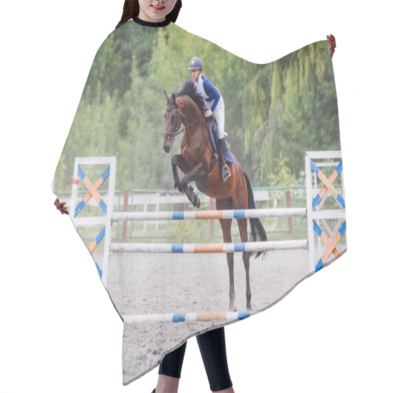 Personality  Young Woman Riding Horseback Jumping Over The Hurdle On Showjumping Course In Equestrian Sports Event Hair Cutting Cape