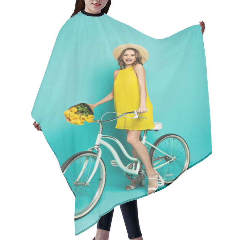 Personality  Cheerful Woman With Tulips Standing Near Bicycle On Blue Background  Hair Cutting Cape