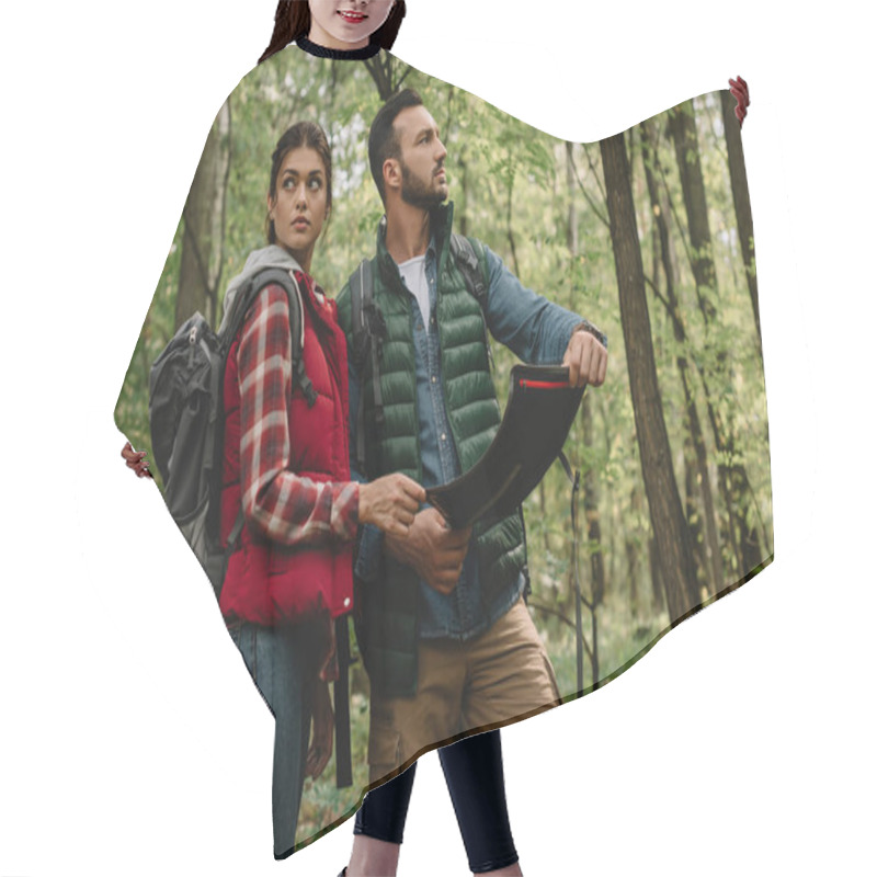 Personality  Man And Woman Looking For Destination On Map While Hiking In Forest Together Hair Cutting Cape