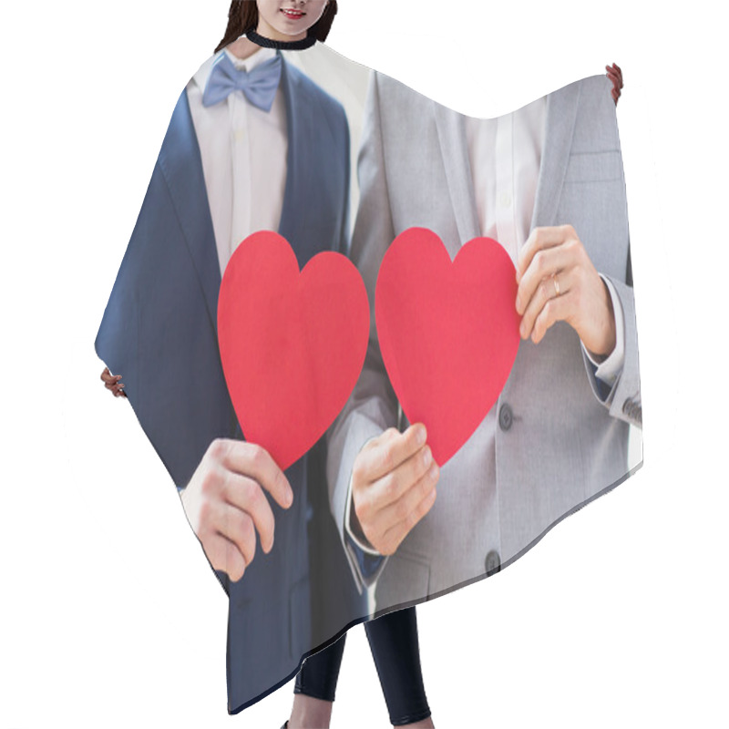 Personality  Close Up Of Male Gay Couple Holding Red Hearts Hair Cutting Cape