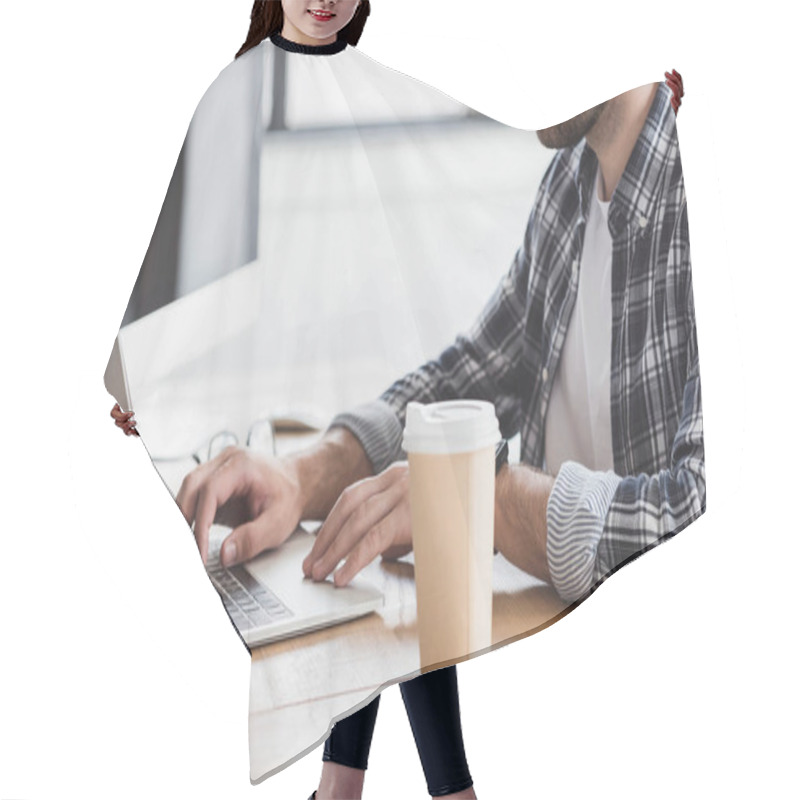 Personality  Cropped Shot Of Young Man Using Laptop At Workplace  Hair Cutting Cape