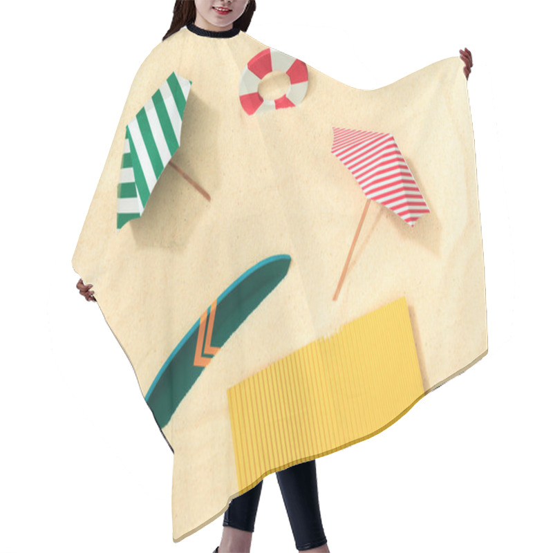 Personality  Top View Of Paper Beach With Lifebuoy, Umbrellas, Surfboard And Towel On Textured Sand  Hair Cutting Cape