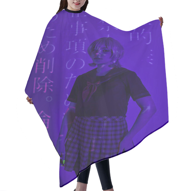 Personality  Cosplay Woman In School Uniform Standing In Blue Neon Light On Backdrop With Hieroglyphs Projection Hair Cutting Cape