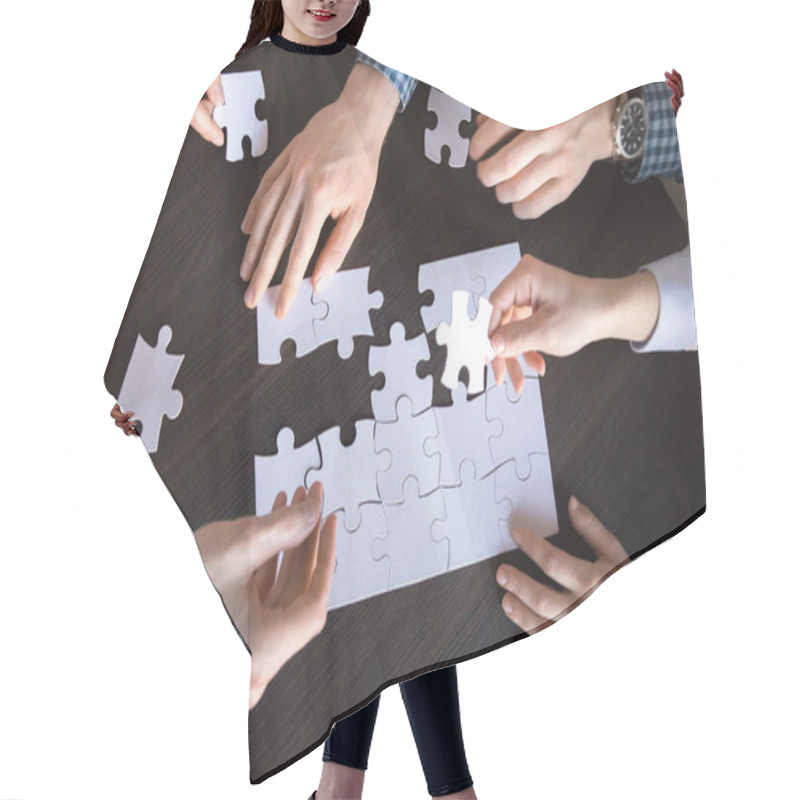 Personality  Top Close Up View Of Hands Engaged In Assembling Puzzle Hair Cutting Cape