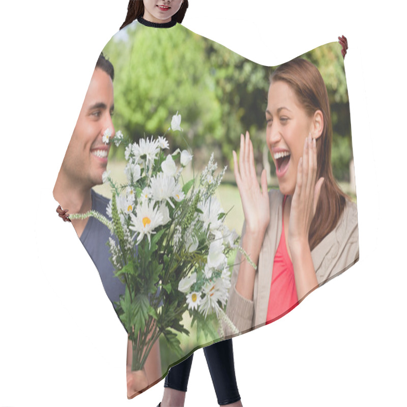 Personality  Woman Laughing Excitedly As She Is Presented With Flowers By Her Hair Cutting Cape