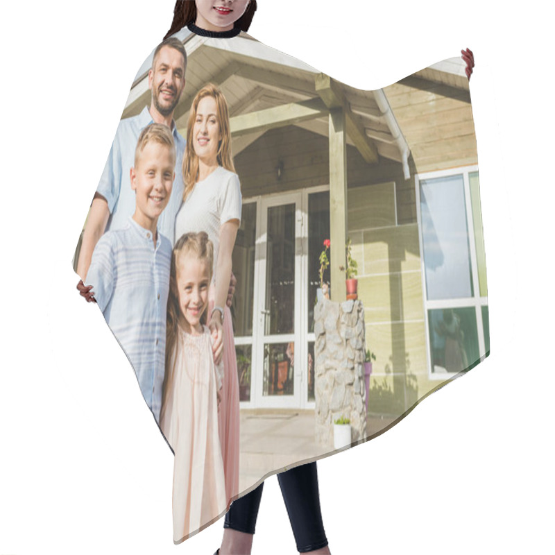 Personality  Smiling Parents And Children Standing In Front Of House Hair Cutting Cape