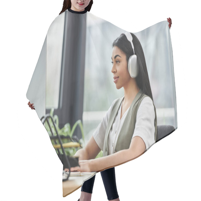 Personality  Engaged Woman Works Diligently At A Desk With Headphones On. Hair Cutting Cape