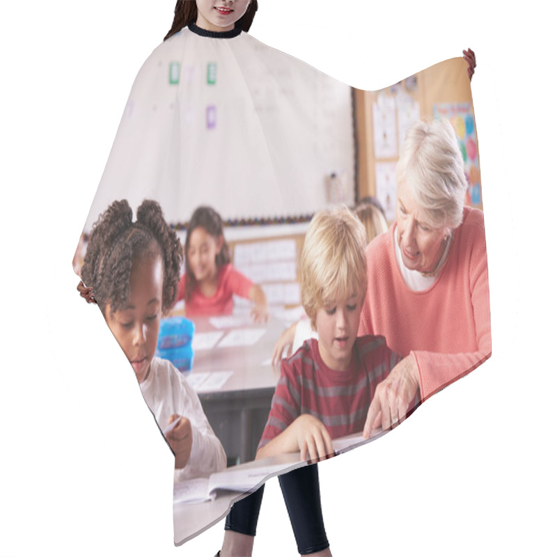 Personality  Senior Teacher Helping Pupils In Class Hair Cutting Cape