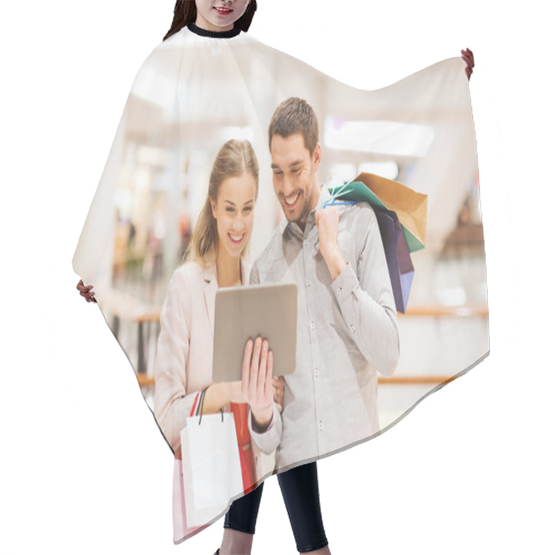 Personality  Couple With Tablet Pc And Shopping Bags In Mall Hair Cutting Cape