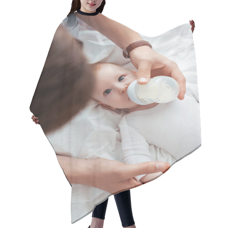 Personality  Overhead View Of Father Feeding Adorable Baby Boy From Baby Bottle With Milk Hair Cutting Cape