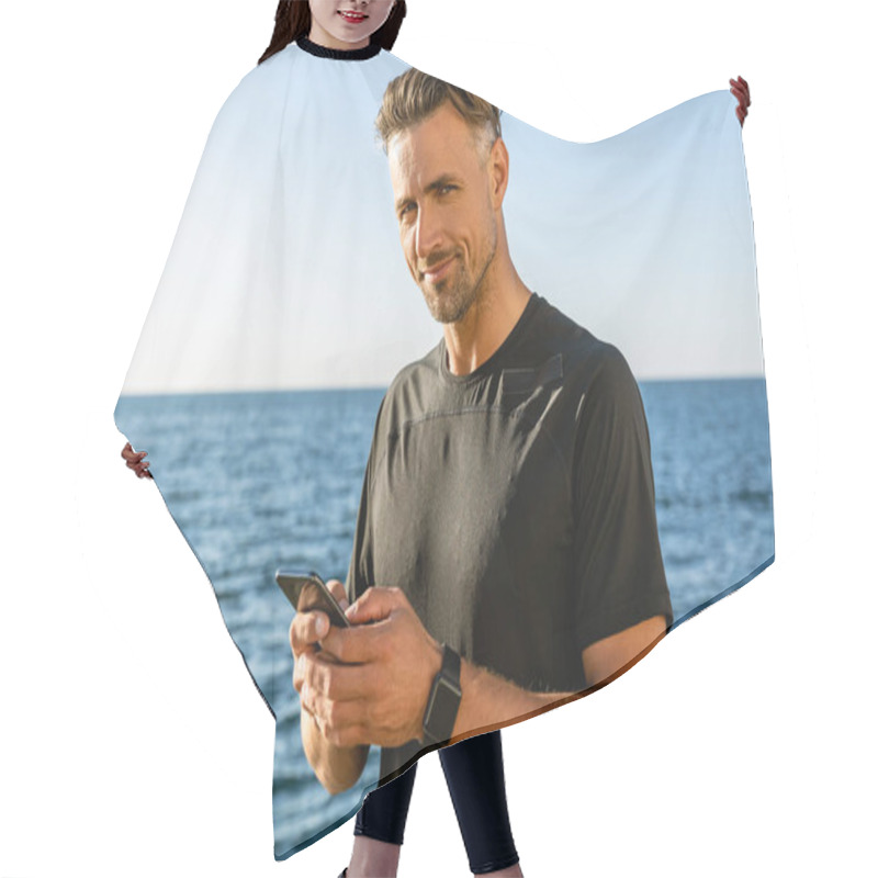 Personality  Handsome Adult Man With Smartphone On Seashore And Looking At Camera Hair Cutting Cape