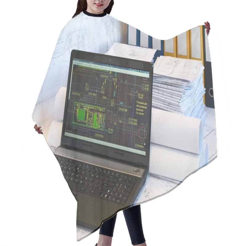 Personality  Laptop Near Pile Of Project Drawings Hair Cutting Cape